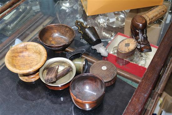 A collection of assorted early 19th century and later treen snuff boxes, four papier mache snuff boxes, a wall